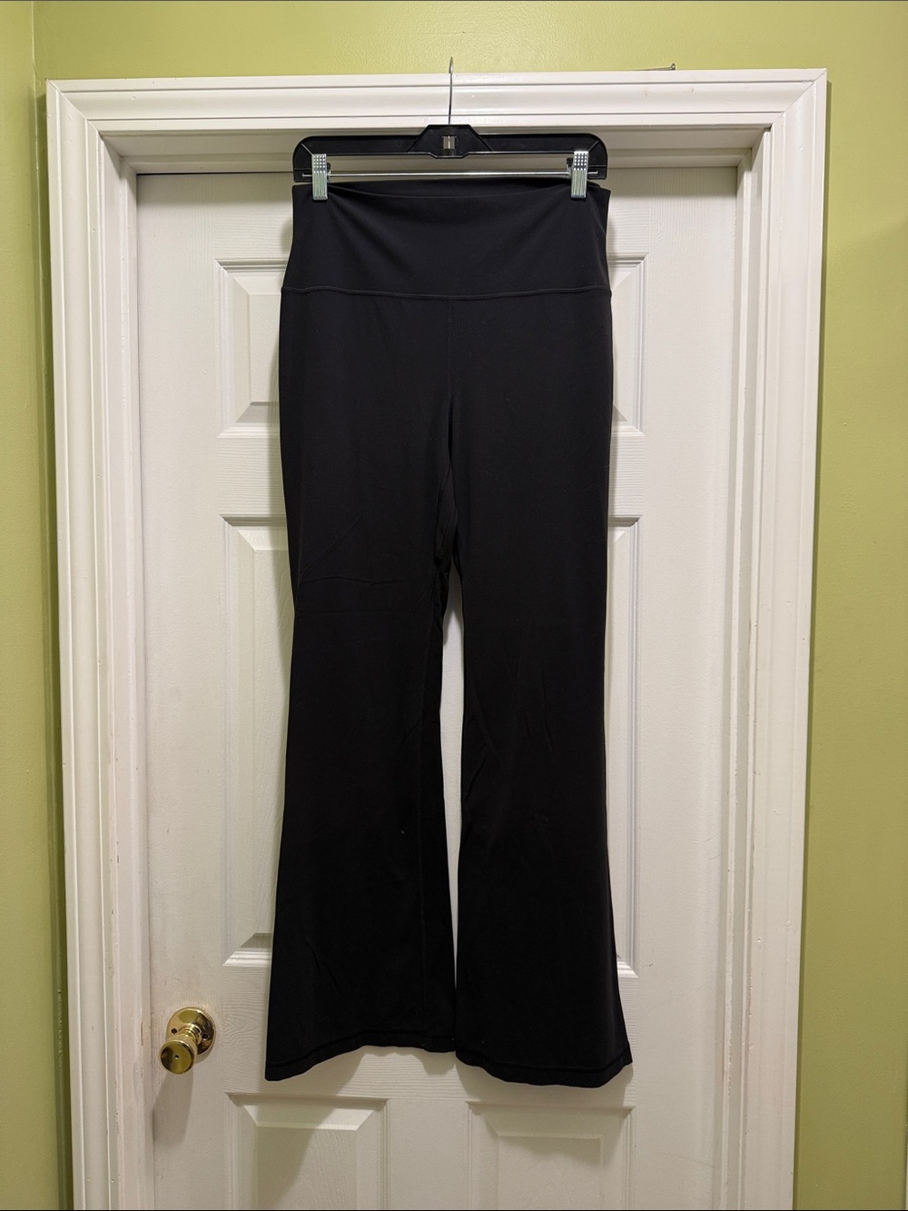 Poshmark title: Aritzia Golden Black High Waist Flare